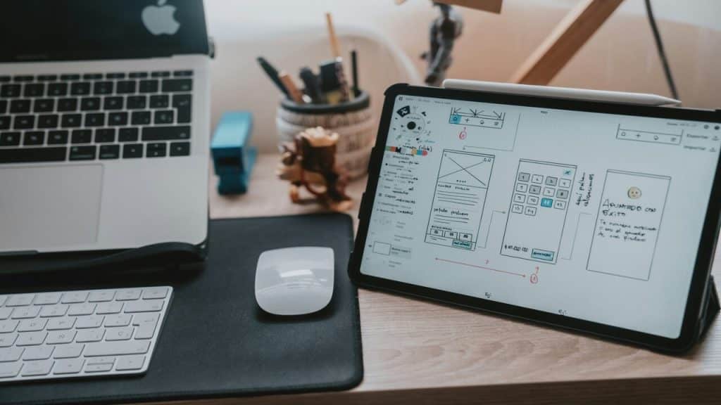 An iPad with a sketch of a UX/UI design
