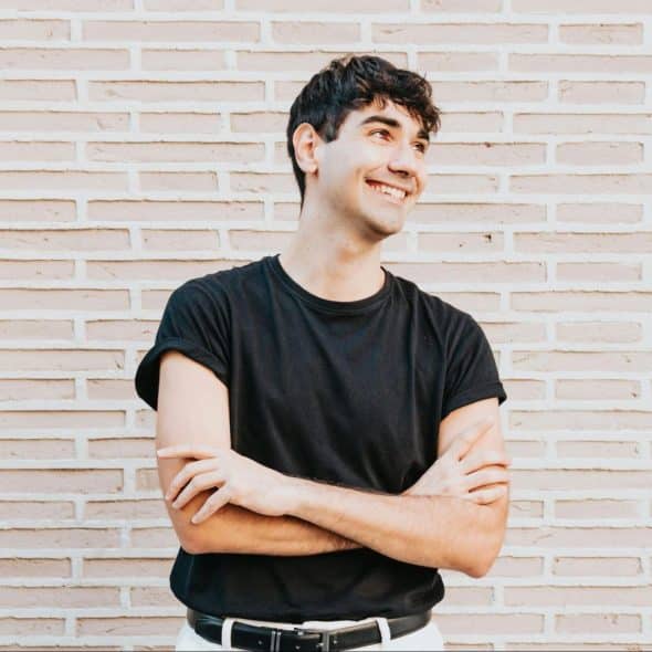 A man looking matured and happy.