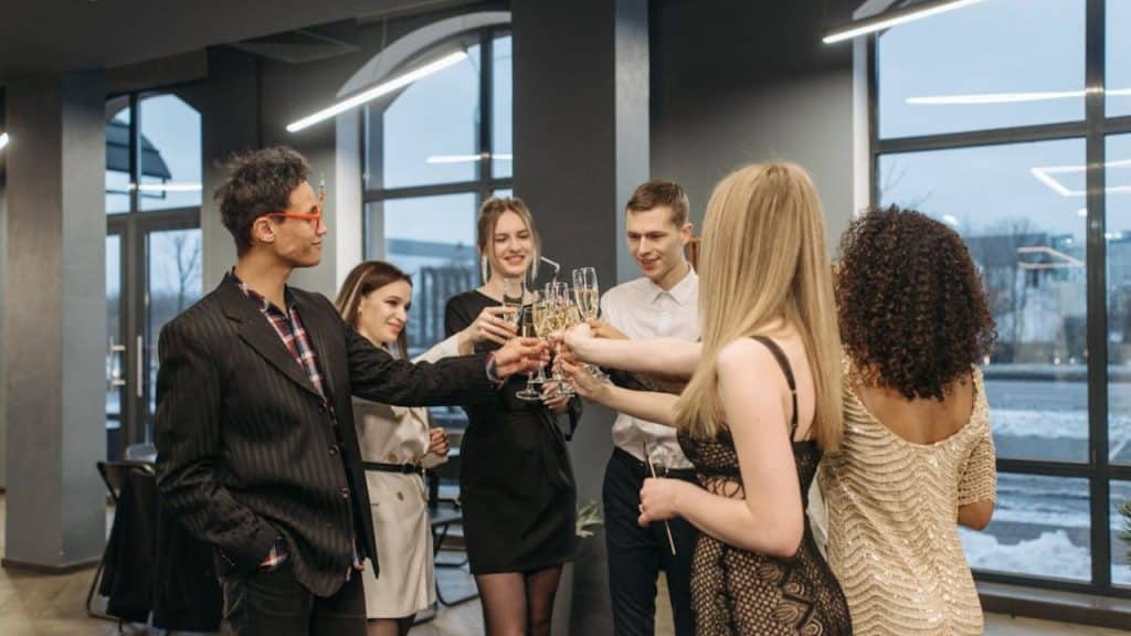 A woman casually showing up at a social event where a man is already present