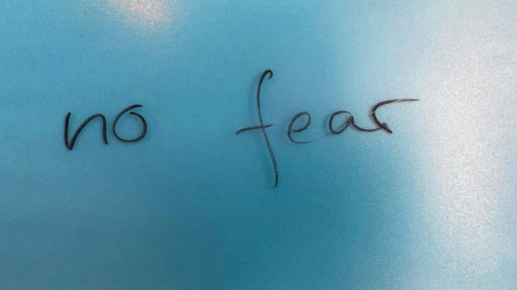 The words “no fear” written in black marker