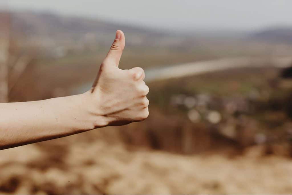 A person doing a thumbs up