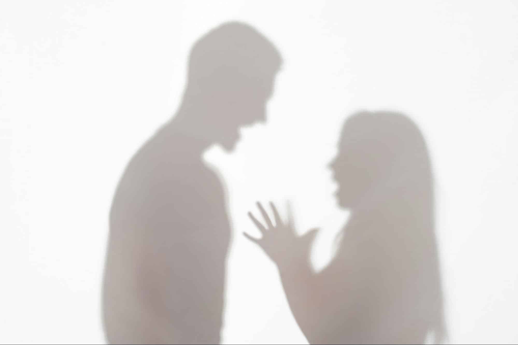A shadow of couple shouting at each other.