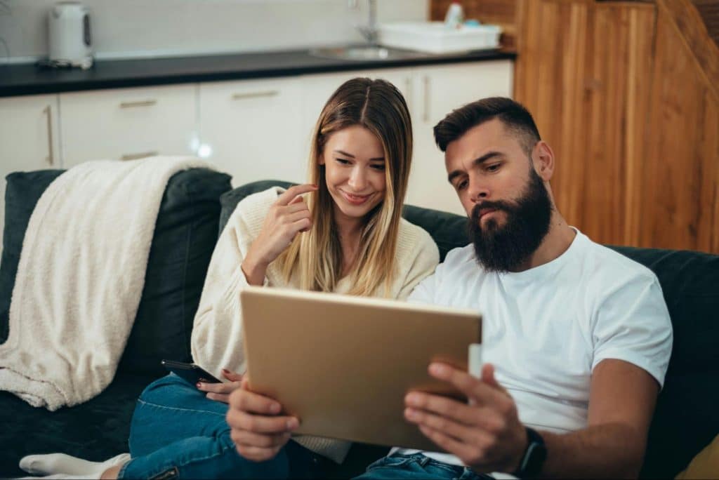 A man showing interest in woman’s work