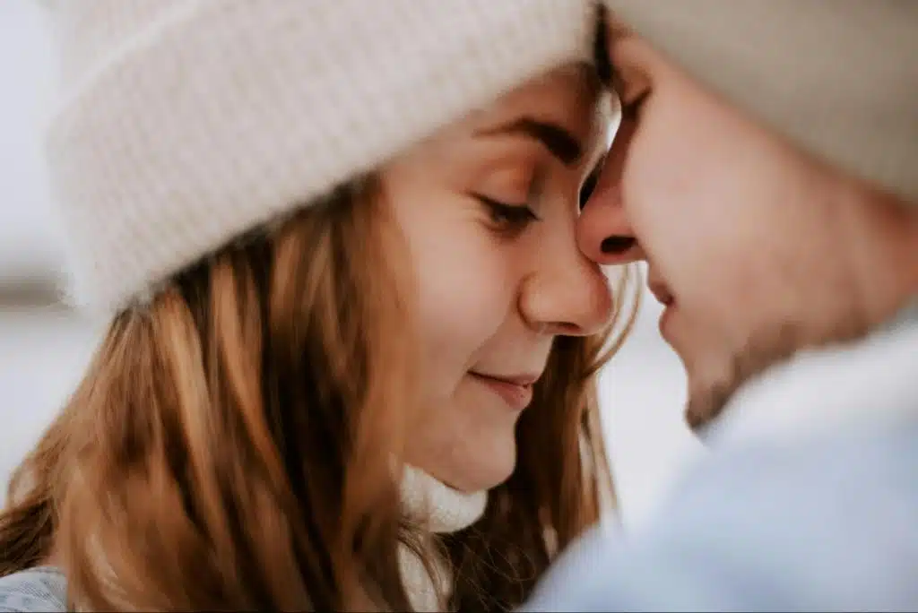 A woman receiving love from a man.