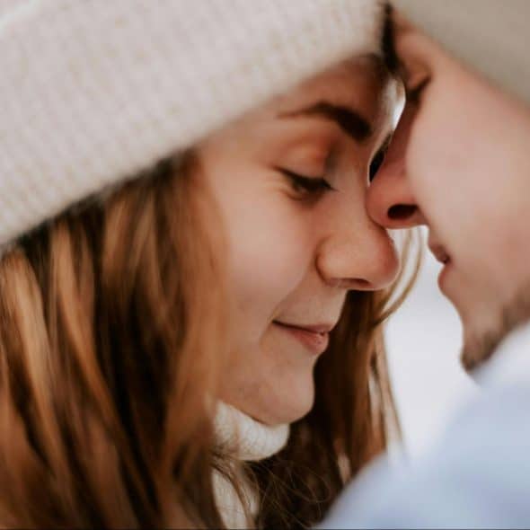 A woman receiving love from a man.