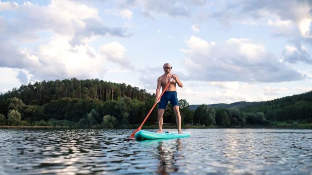 Man embracing the future with strength and healthy aging mindset