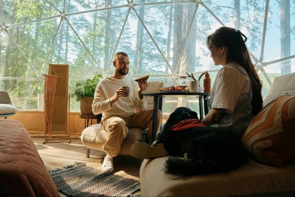 A man and woman having a breakfast coffee
