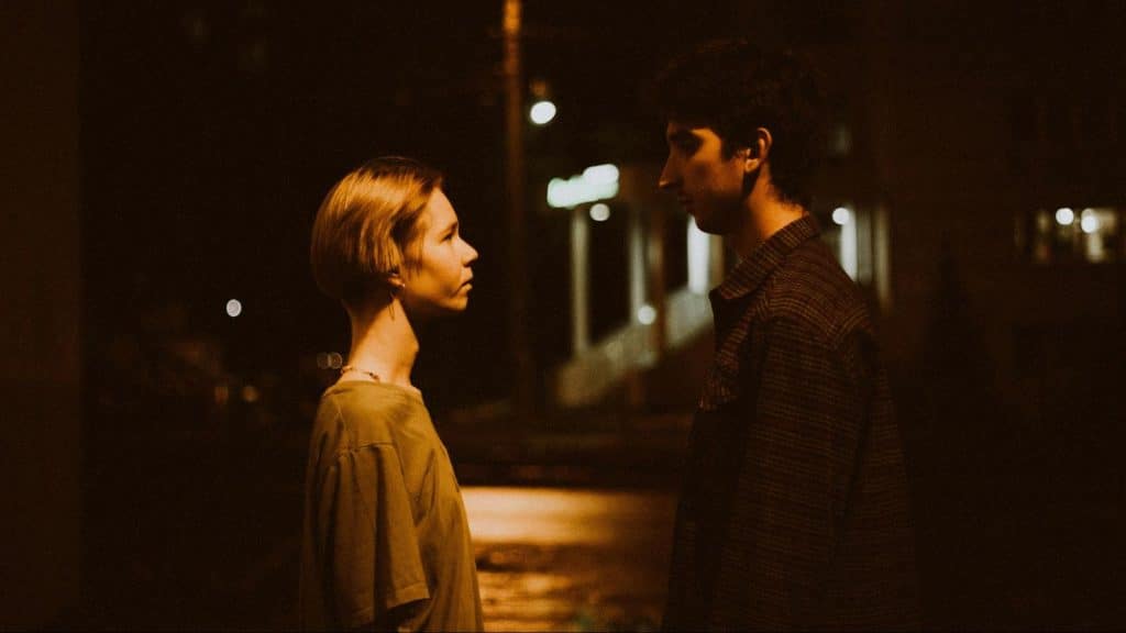 A man and woman talking.