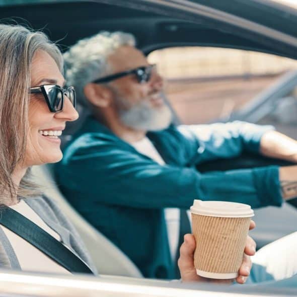 A mature couple in the car.