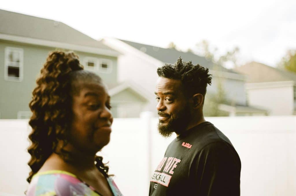 A woman trying not to laugh