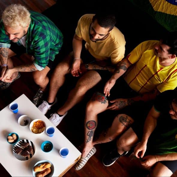 Men watching something.