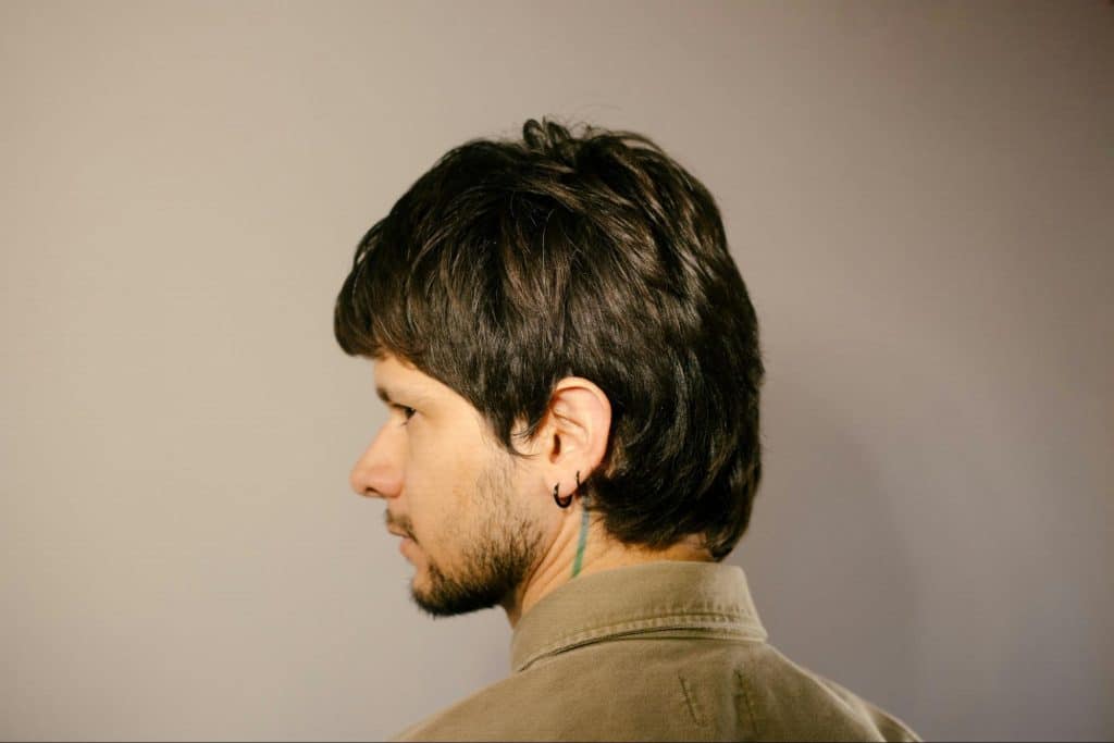 A picture of a man with thick hair