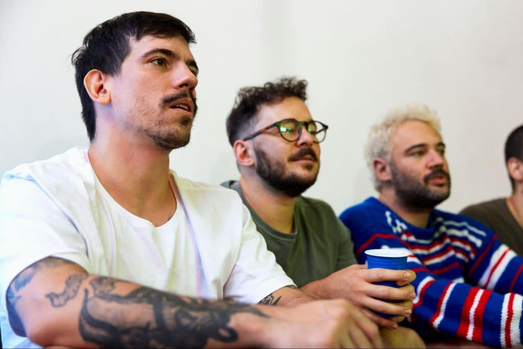 Men watching a series.