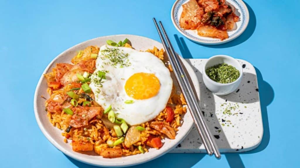 Plate with protein and kimchi on the side.