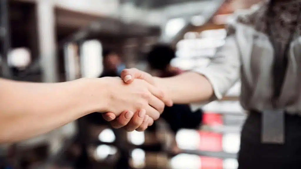 Two people shaking hands