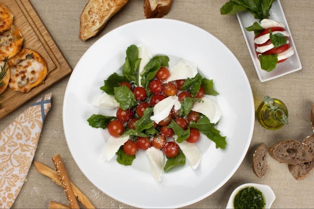 A picture of a tomatoes with cottage cheese.