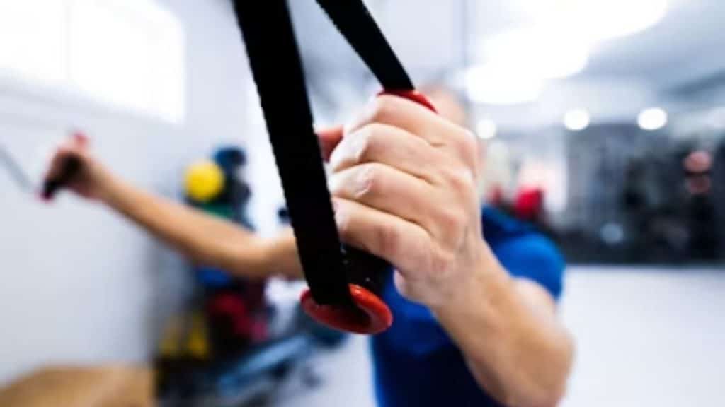 Active man performing flexibility work to ease muscle tightness
