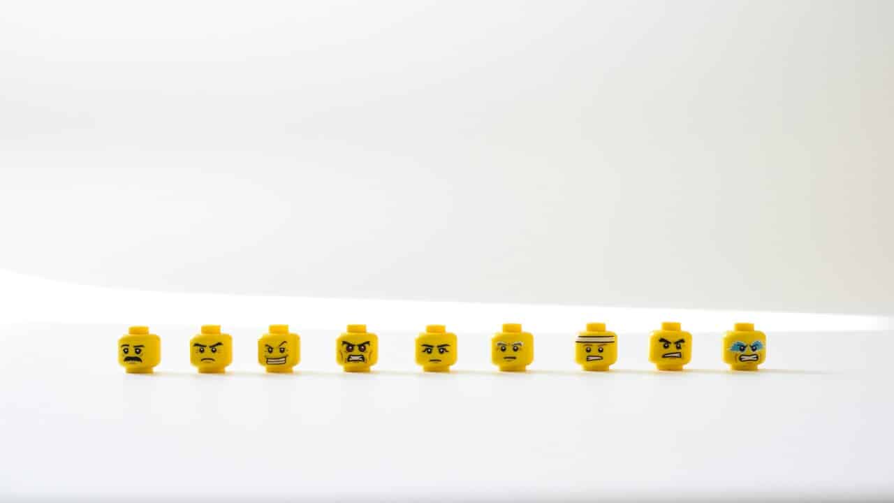 Lego pieces featuring different emotions.
