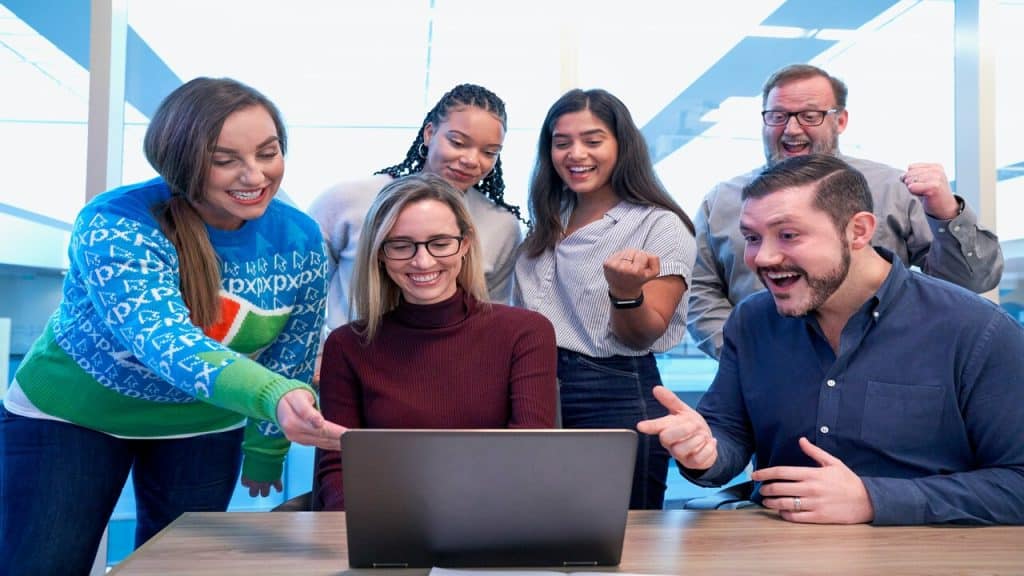 Colleagues having fun at the office.