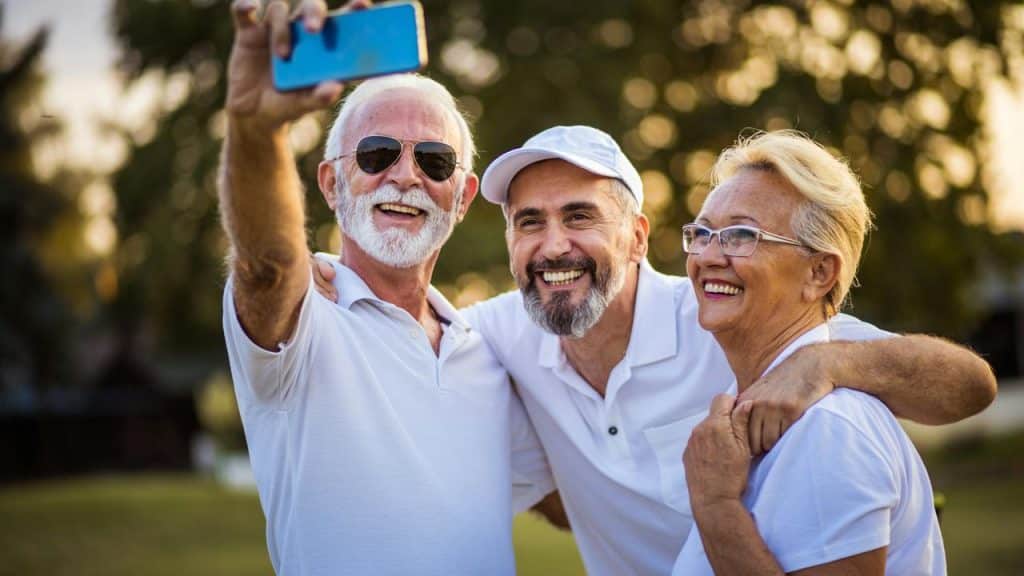 A group of seniors taking a selfie.