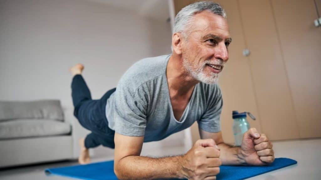 Middle aged man practicing balance to reduce fall risk
