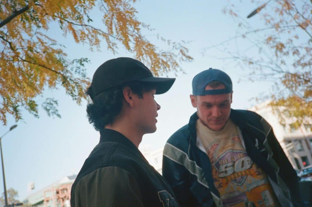 Two men having a discussion.