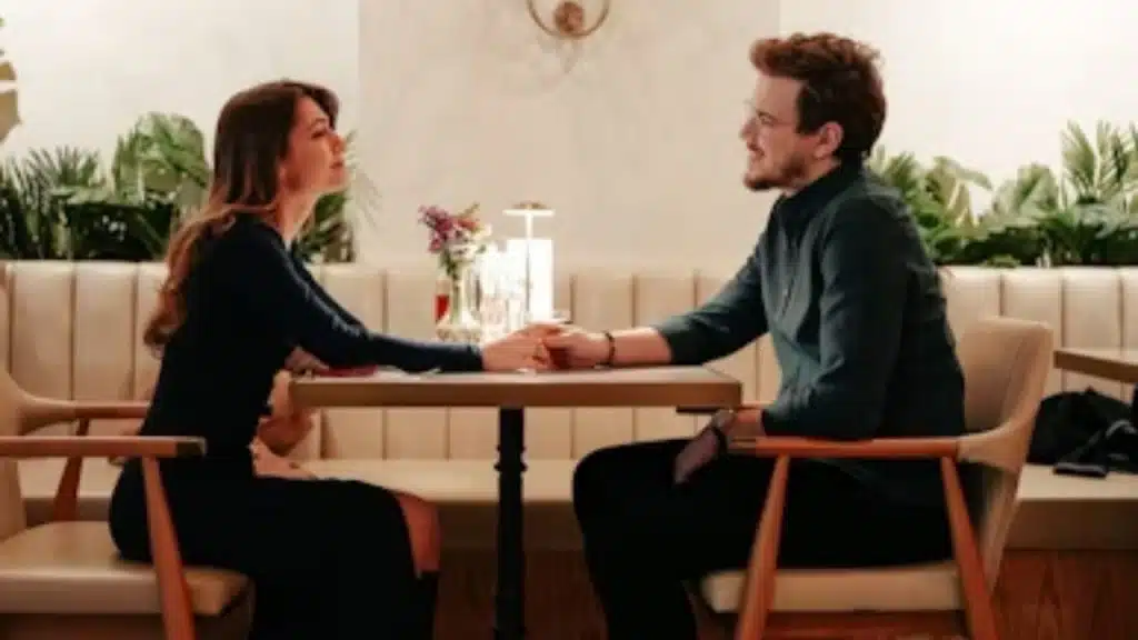 Couple having a focused conversation without devices.