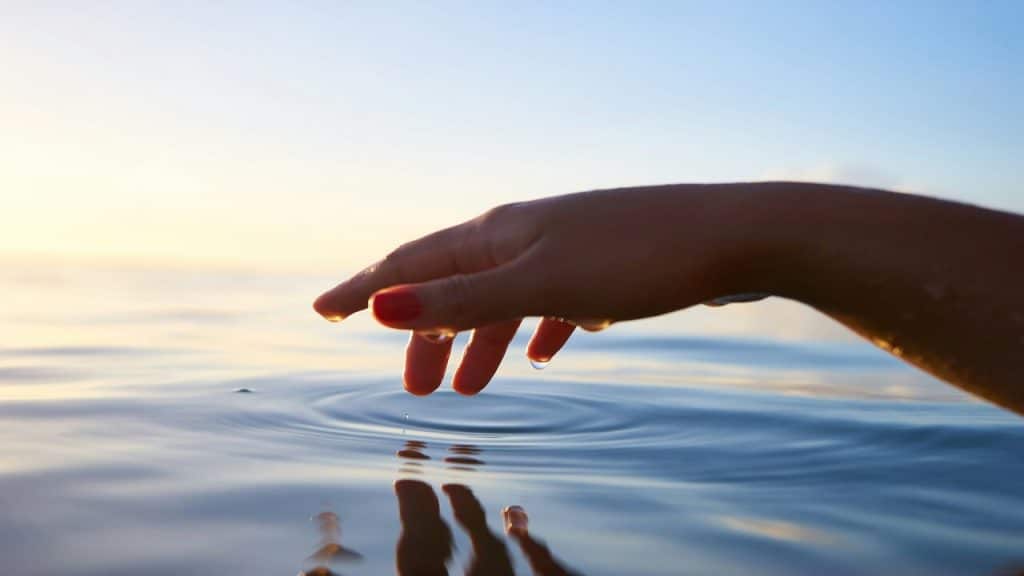 A person touching water