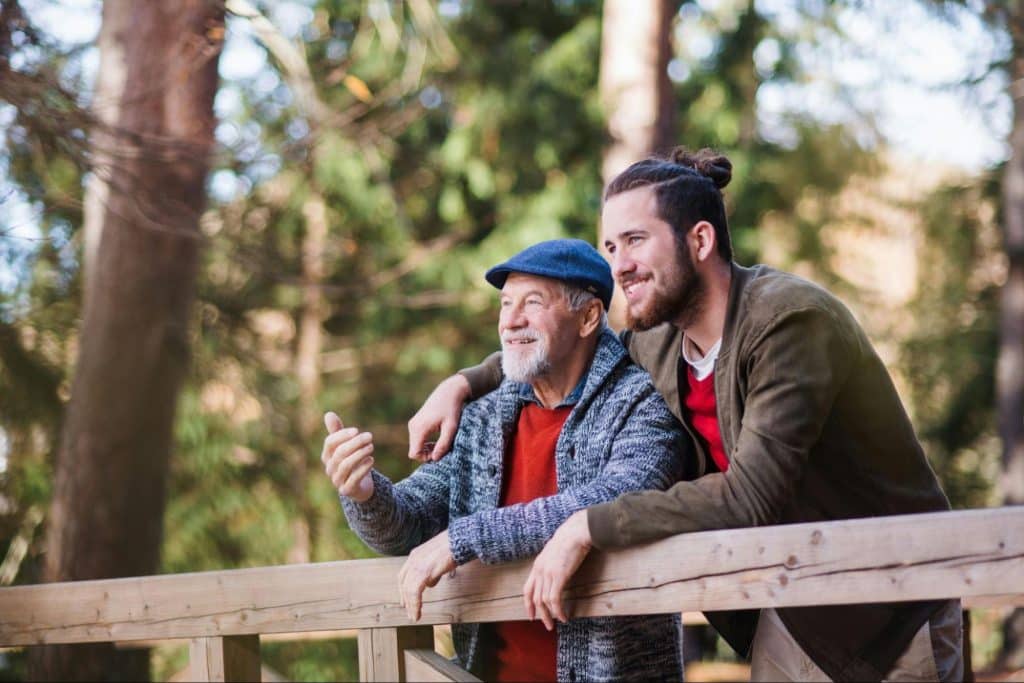 A father and son talking.