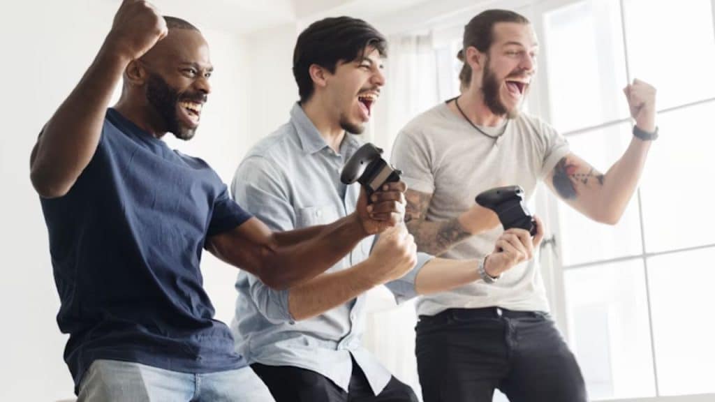 Group of men enjoying video games with laughter in a cozy space