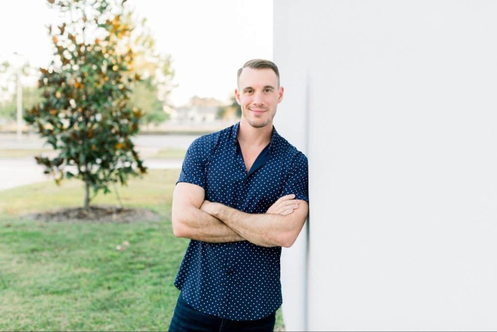 A man wearing a polka dot shirt.