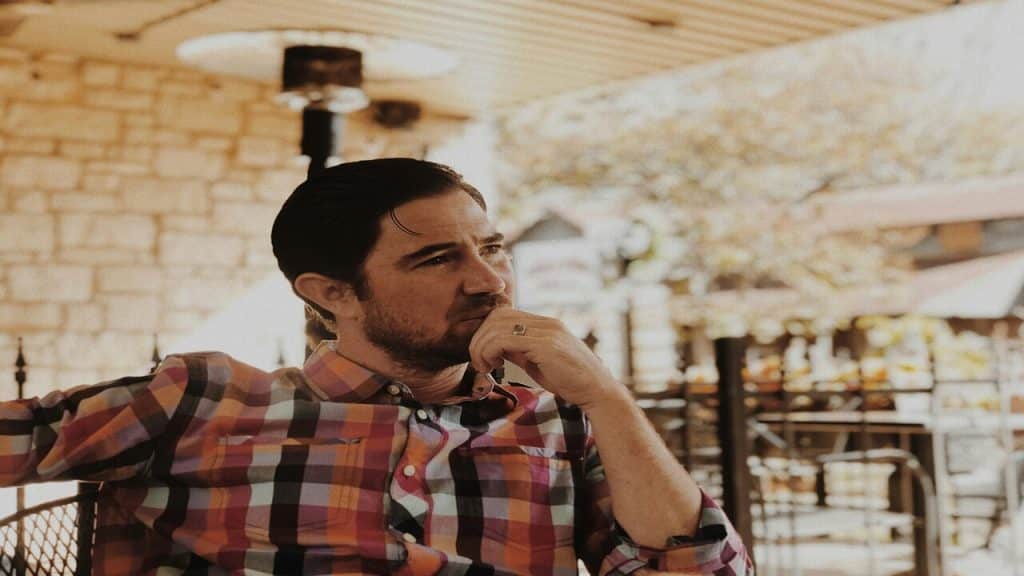 A man thinking by himself