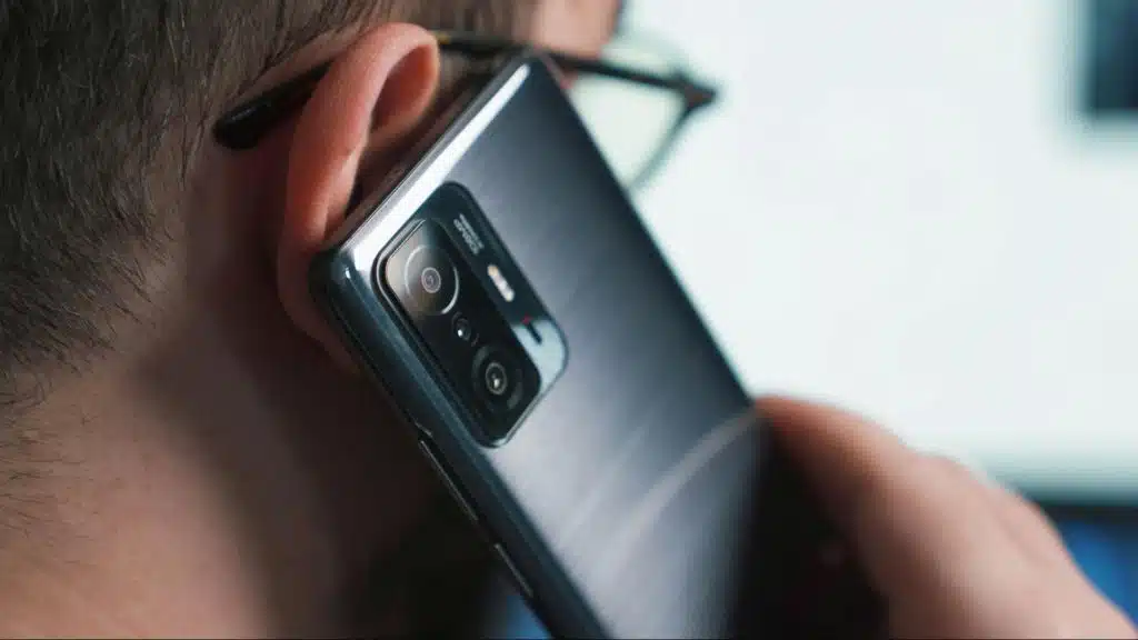 A man talking someone at the phone