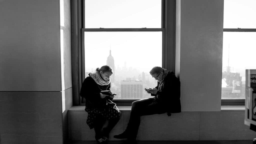 Friends sitting by the window