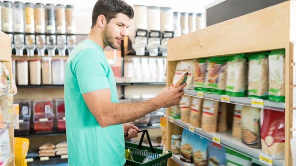 Man enjoying solo time while picking up groceries