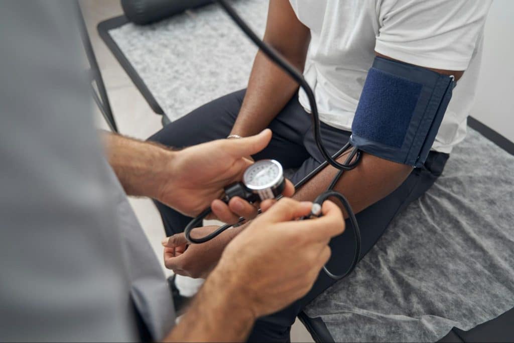 A man getting a blood pressure check-up