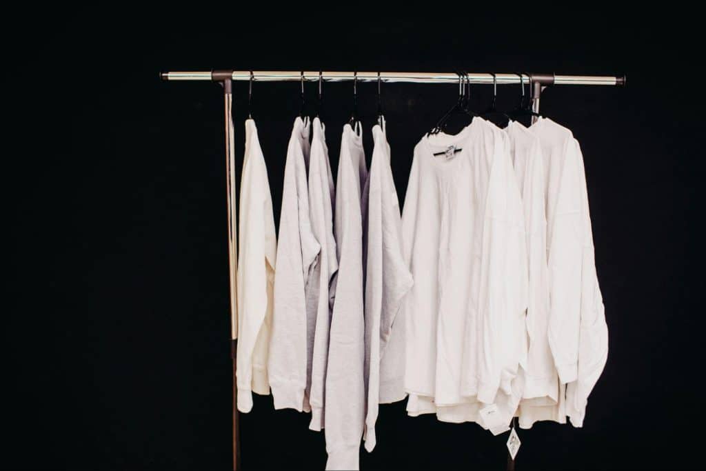 A clothes hanging on the rack 