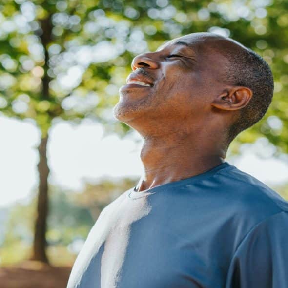 A man breathing fresh air