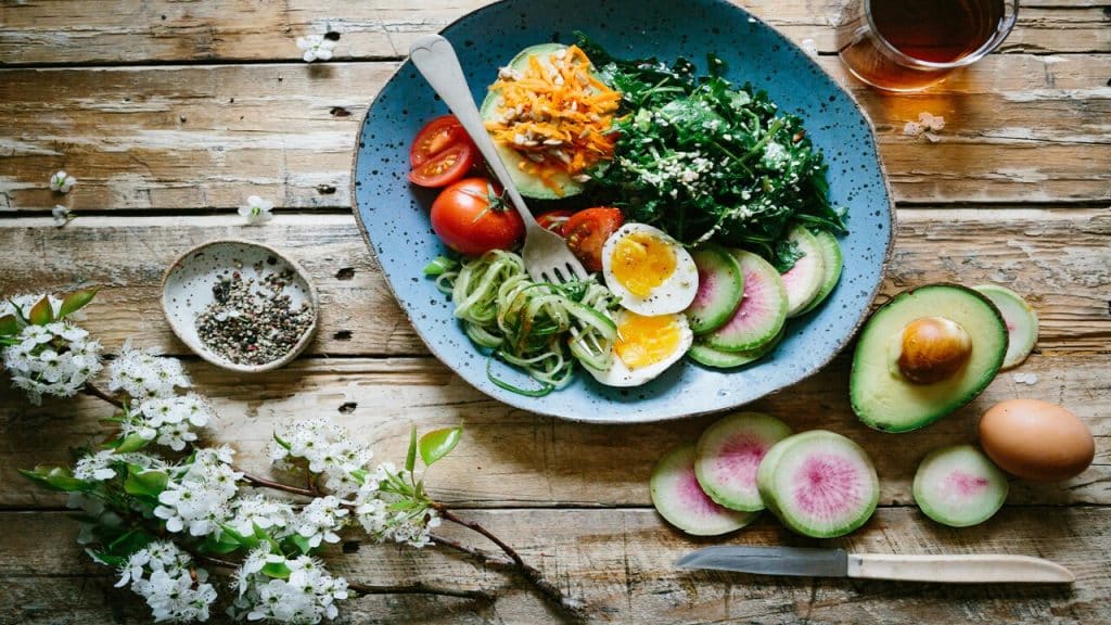 A salad with poached egg