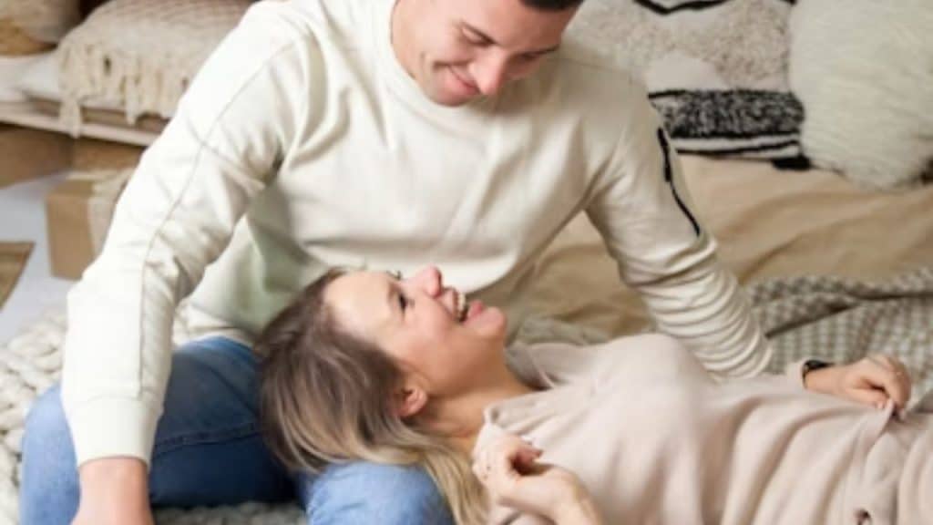 Man quietly creating a supportive environment for his partner