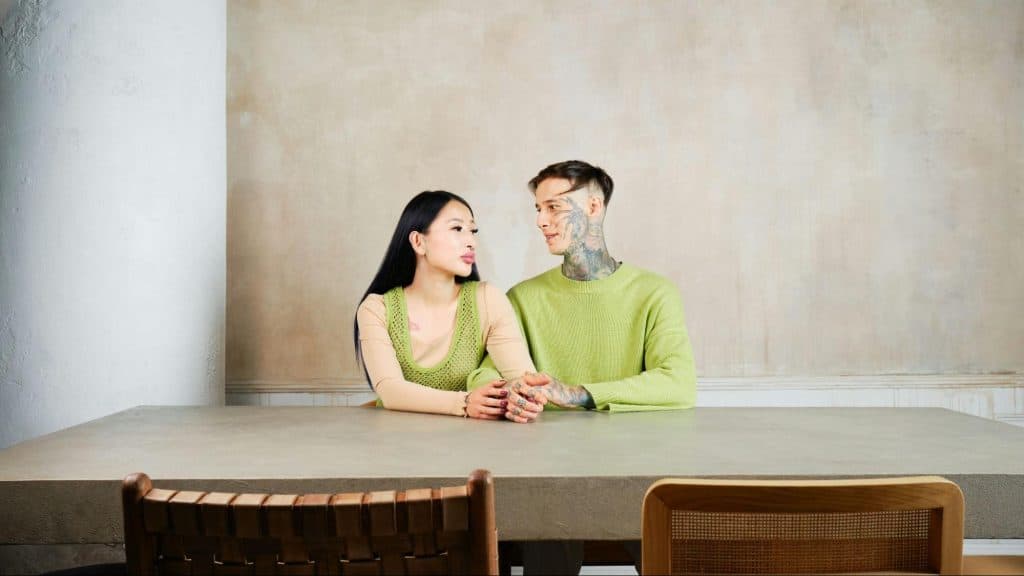 A woman looking upset and a calm man