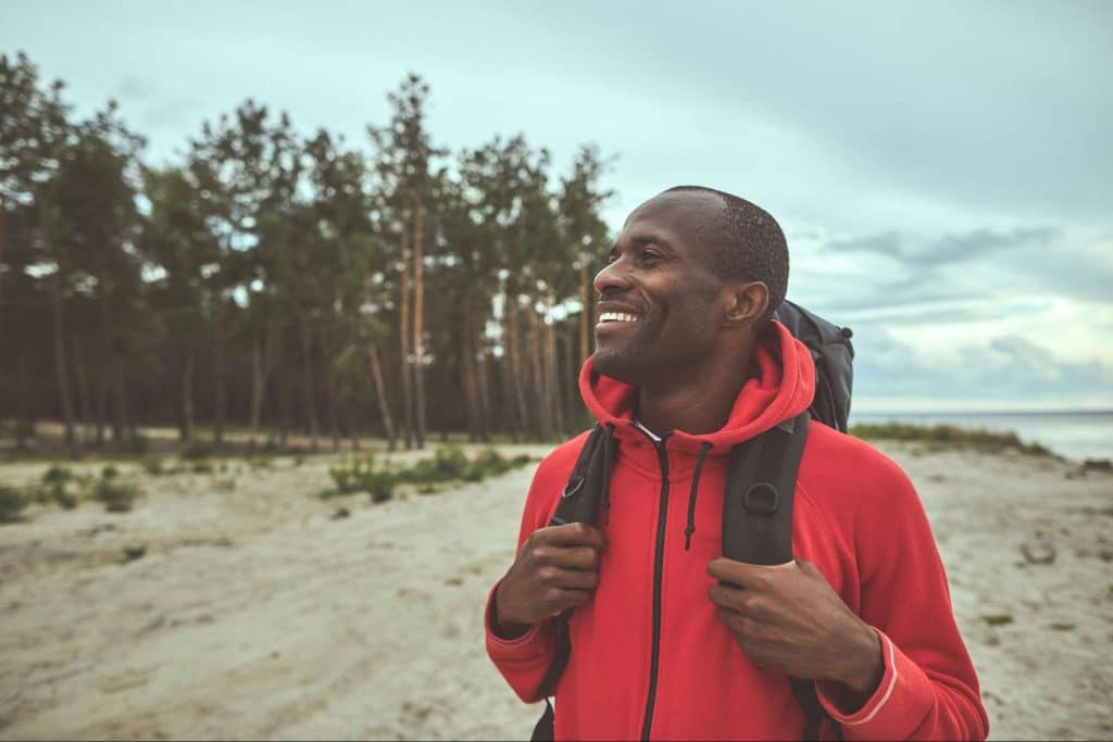 A man being happy doing adventures.