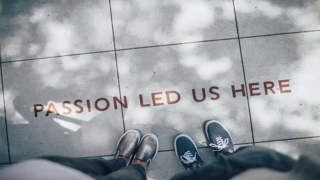 “Passion led us here” written on concrete
