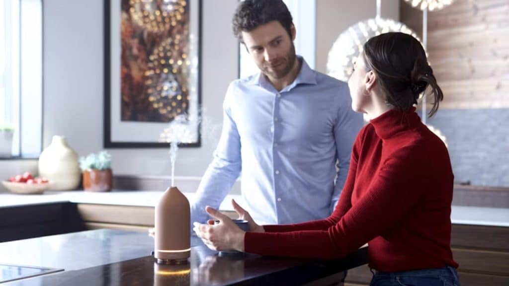 A man and woman calmly discussing space at home