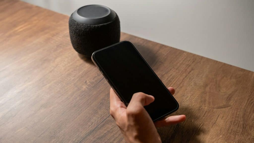 A person preparing to play music at home