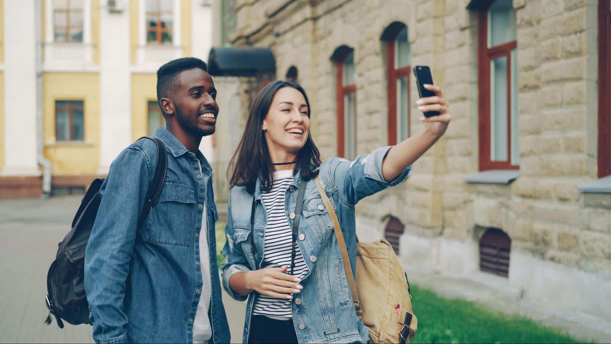 A man and woman taking picture together.