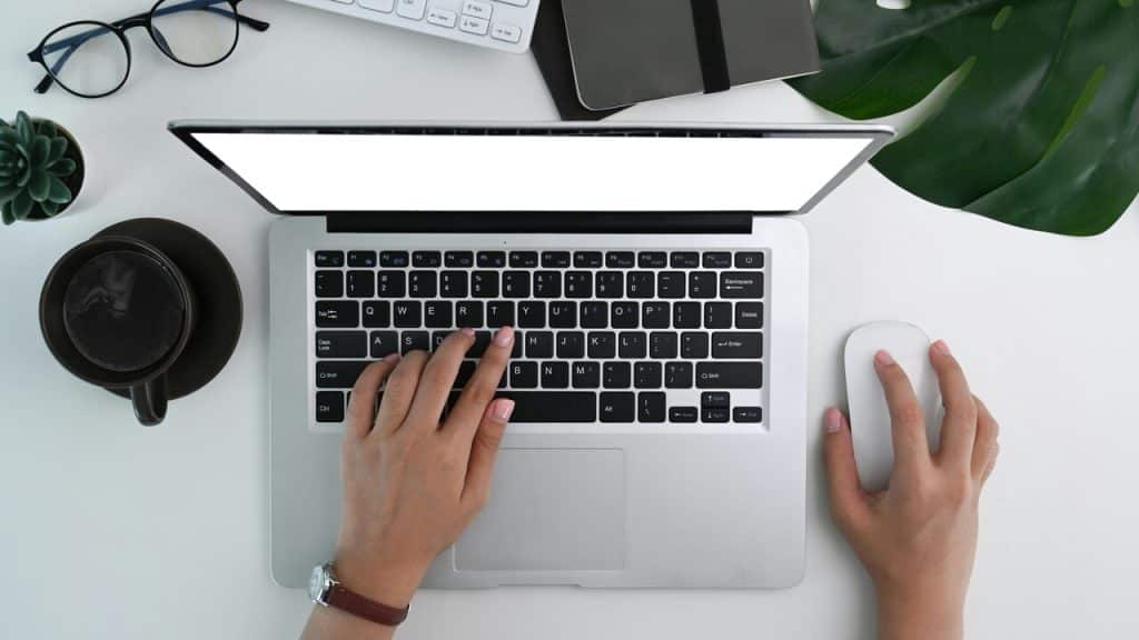 A person using his laptop