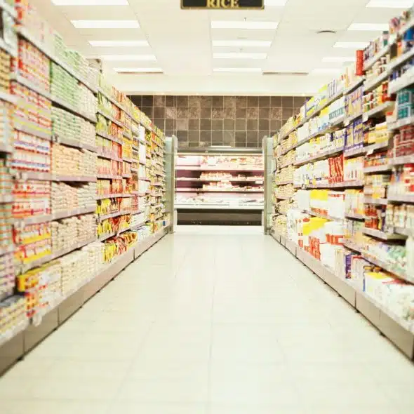 A picture of an isle of grocery store.
