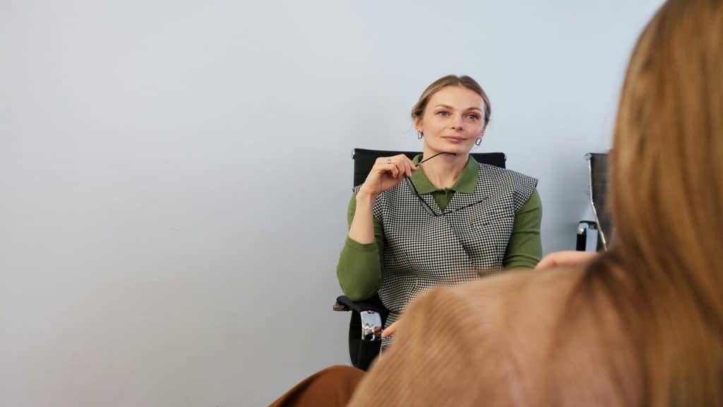 An employee talking to her boss