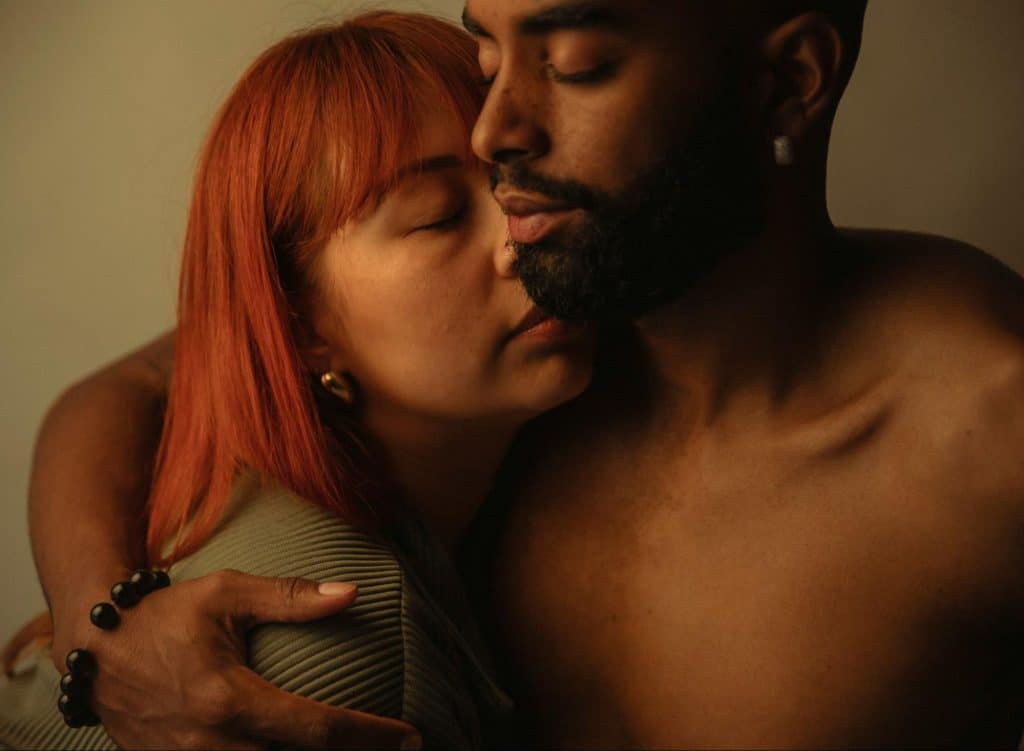 A man comforting a woman